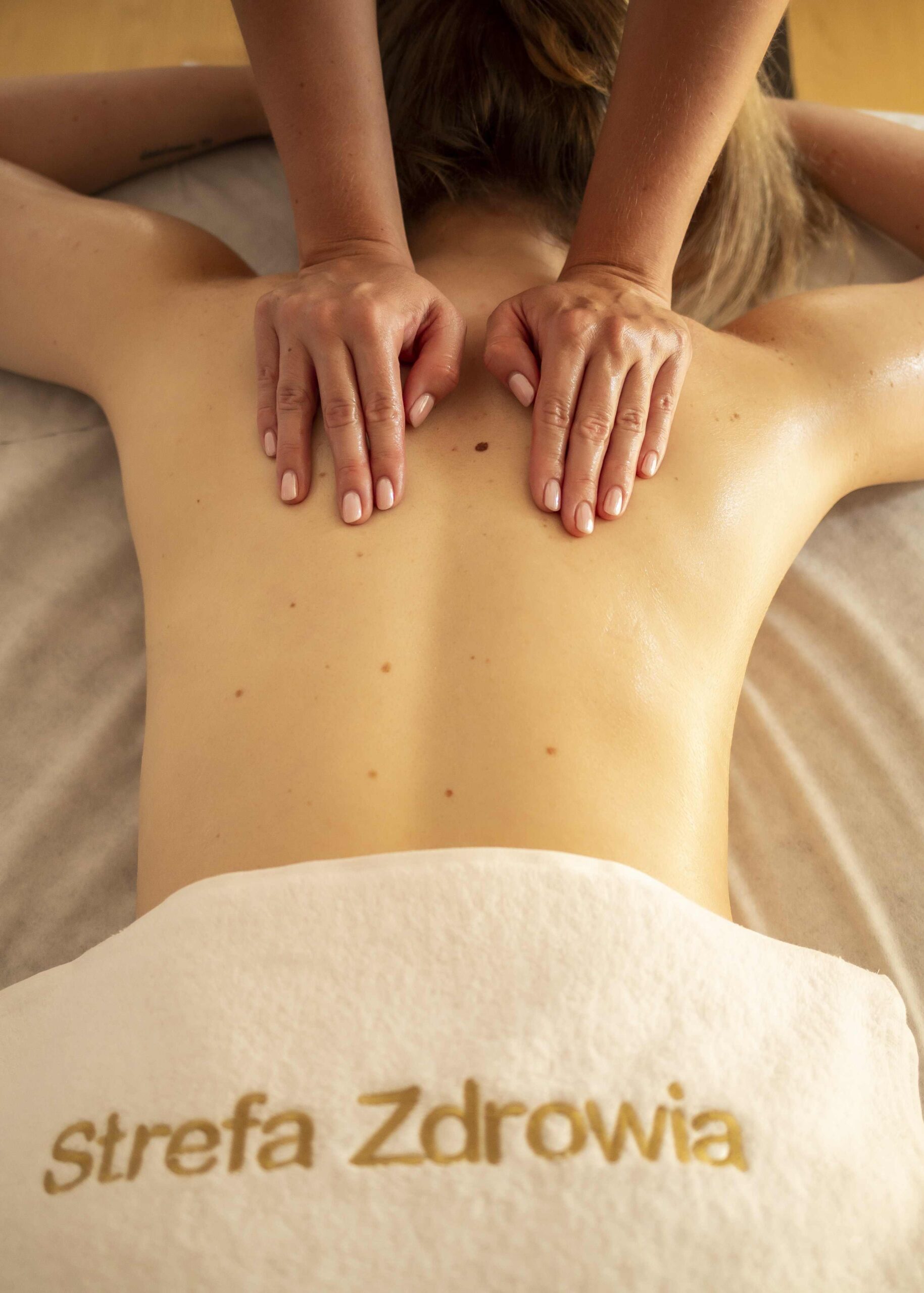 Strefa Zdrowia Wilanów w Warszawie - masaż, fizjoterapia, zabiegi - Masaż olejem kokosowym